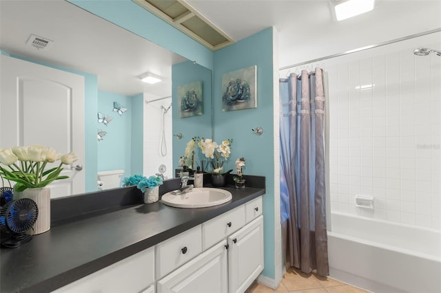 full bathroom featuring tile patterned floors, vanity, toilet, and shower / bathtub combination with curtain