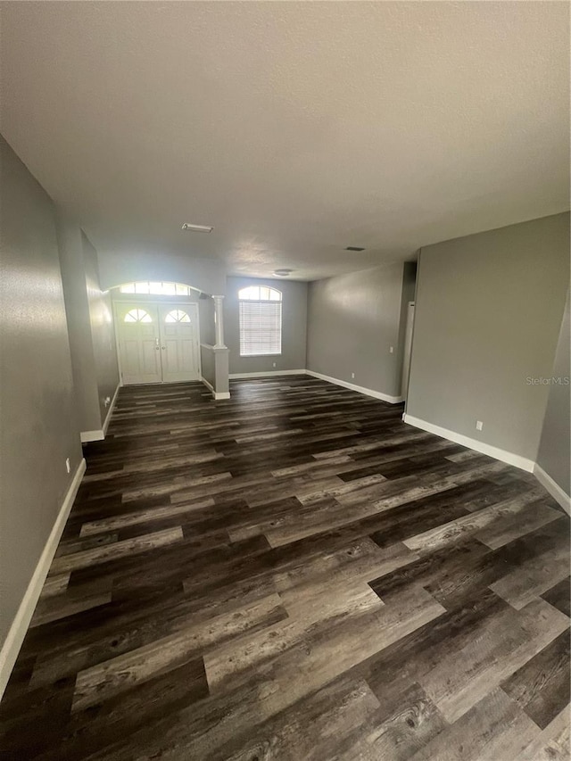 interior space with dark wood-type flooring