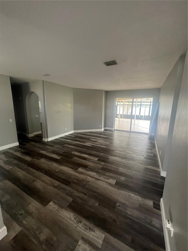 empty room featuring dark hardwood / wood-style floors