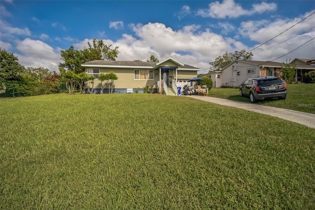 view of front facade featuring a front yard