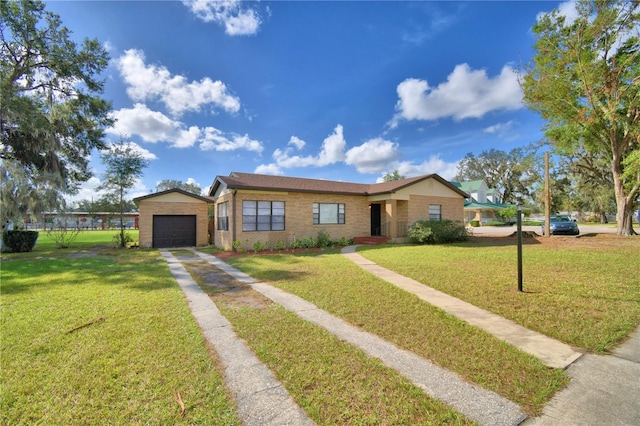 ranch-style house with a garage and a front lawn