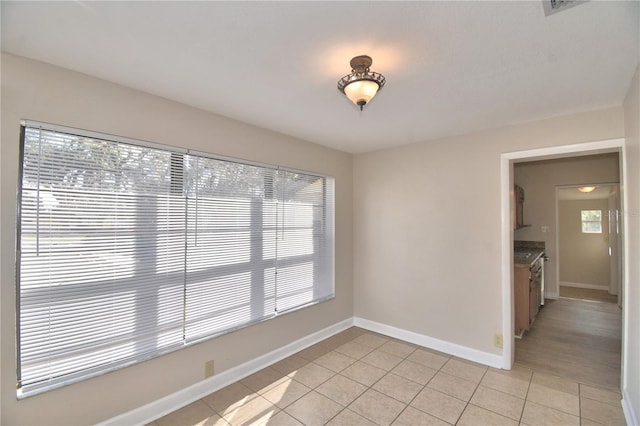 view of tiled empty room