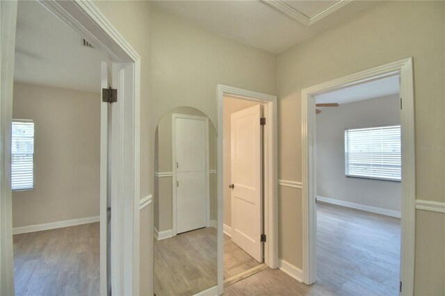 hall with light hardwood / wood-style floors