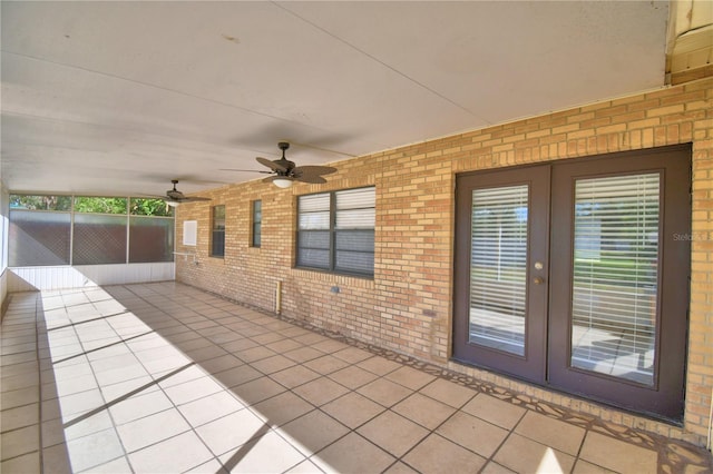 view of patio / terrace featuring ceiling fan and french doors