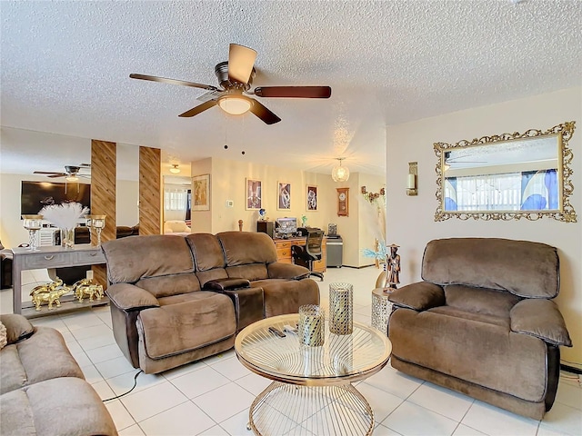 tiled living room featuring a textured ceiling and ceiling fan