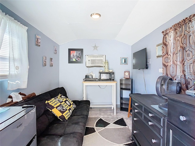 living room with a wall mounted air conditioner and lofted ceiling