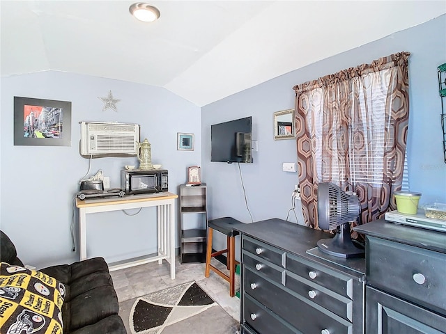 living room with vaulted ceiling and a wall mounted AC