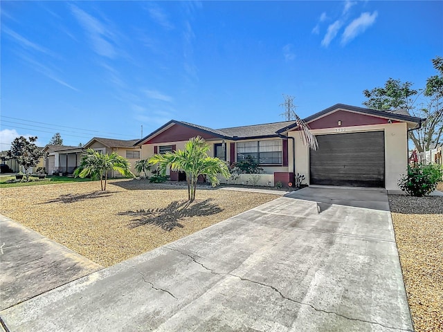 single story home with a garage