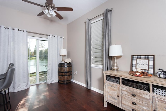 office area with dark hardwood / wood-style flooring and ceiling fan