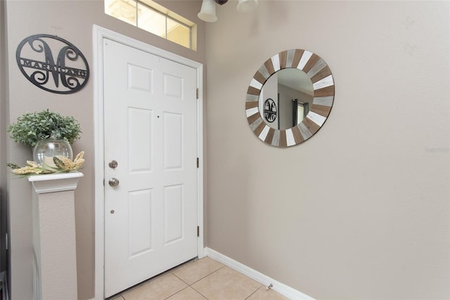 view of tiled foyer entrance