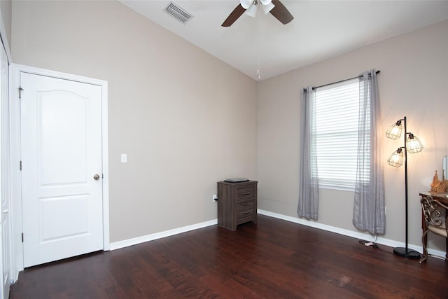 unfurnished room with dark wood-type flooring, ceiling fan, and lofted ceiling