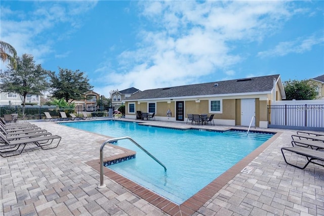 view of swimming pool with a patio area