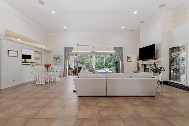 living room with light tile patterned floors and crown molding