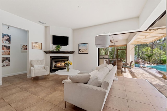 living room with light tile patterned flooring