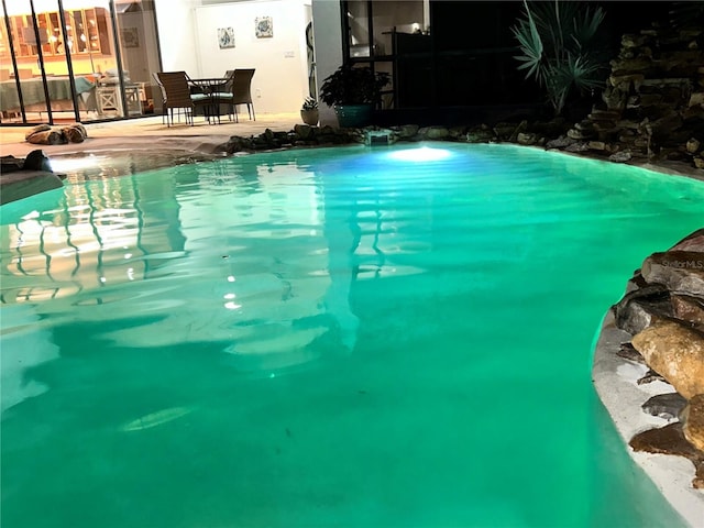 view of pool with a patio