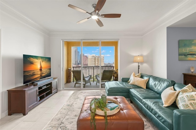 living room featuring ceiling fan, crown molding, and light tile patterned flooring