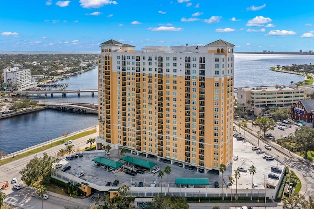 birds eye view of property featuring a water view