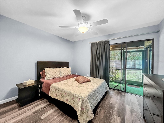 2920 Star Apple Ct, Palm Harbor, FL 34684 - bedroom featuring wood finished floors, access to exterior, ceiling fan, and baseboards