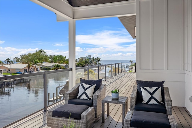 balcony featuring a water view