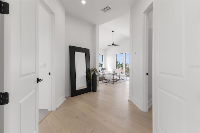 hallway featuring light hardwood / wood-style flooring