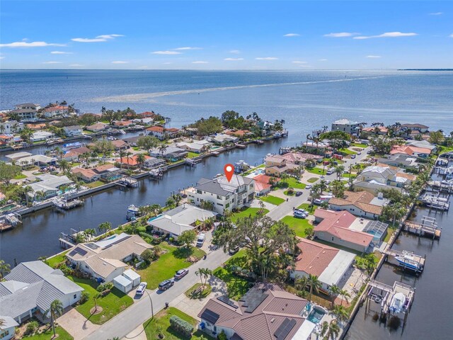 bird's eye view featuring a water view and a residential view