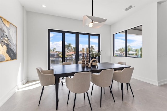 dining area featuring recessed lighting, baseboards, and visible vents