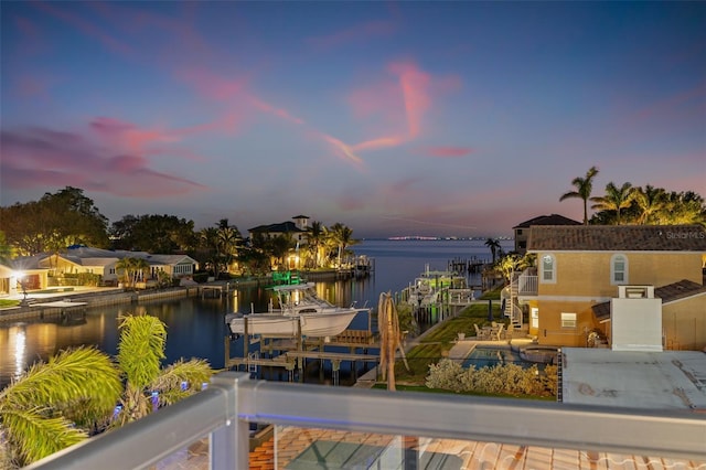 property view of water with boat lift and a boat dock