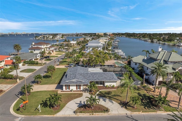 birds eye view of property featuring a water view