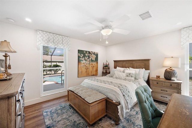 bedroom featuring recessed lighting, visible vents, ceiling fan, wood finished floors, and baseboards