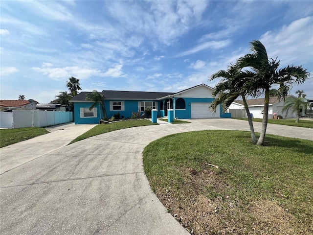 single story home with a garage and a front yard