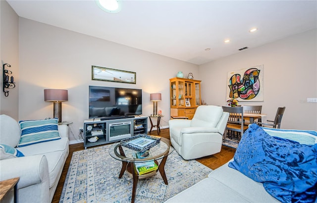 living room with hardwood / wood-style flooring