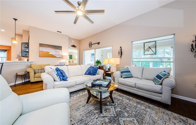 living room featuring lofted ceiling, hardwood / wood-style flooring, and ceiling fan