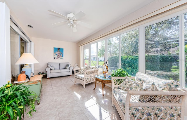 sunroom with ceiling fan