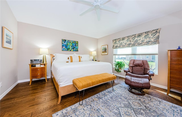 bedroom featuring dark wood-type flooring and ceiling fan