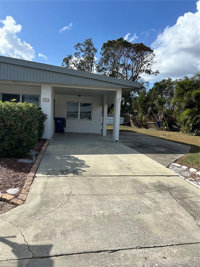 garage with a carport