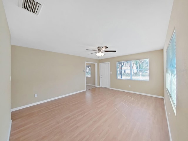 unfurnished room with light hardwood / wood-style floors and ceiling fan