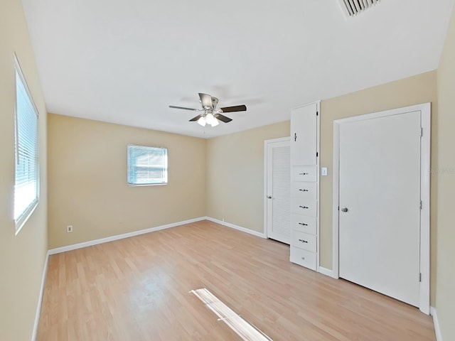 interior space featuring light hardwood / wood-style floors and ceiling fan