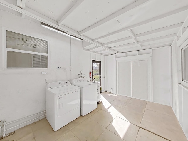 washroom with washer and clothes dryer