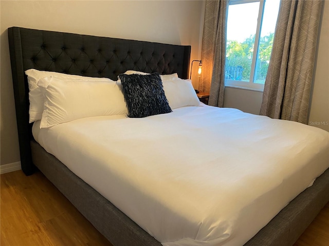 bedroom featuring hardwood / wood-style flooring