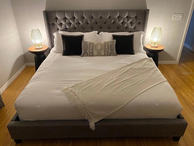 bedroom featuring hardwood / wood-style flooring