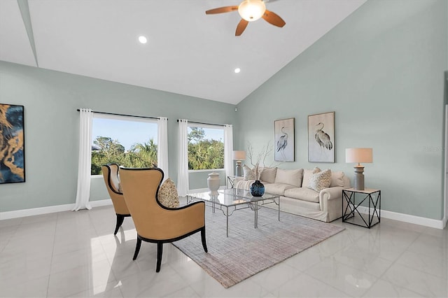 living room featuring ceiling fan and high vaulted ceiling