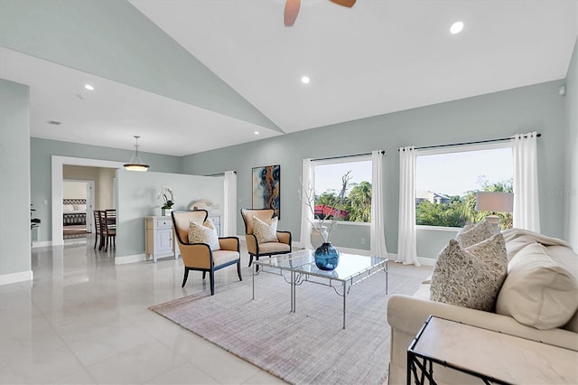 living room with vaulted ceiling and ceiling fan