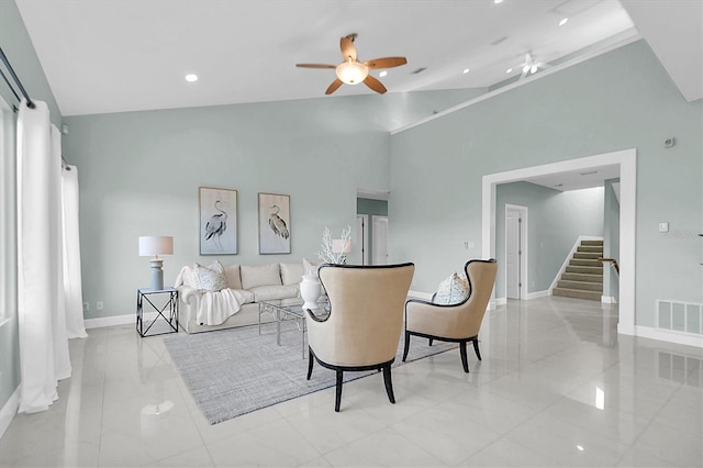 living room featuring high vaulted ceiling and ceiling fan