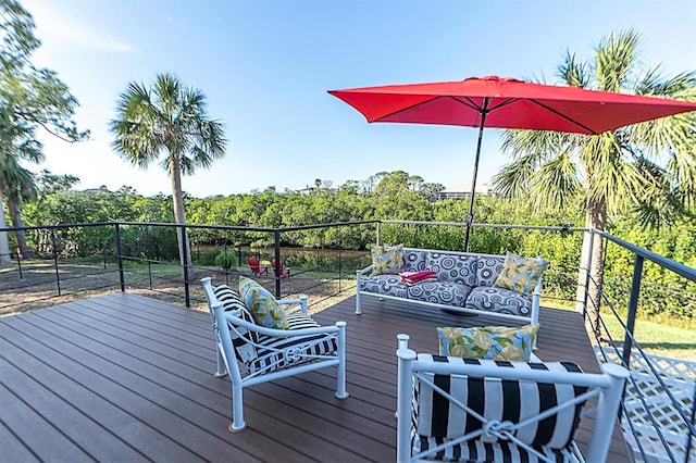 wooden deck with outdoor lounge area