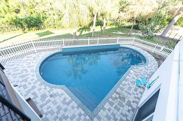 view of pool featuring a patio area