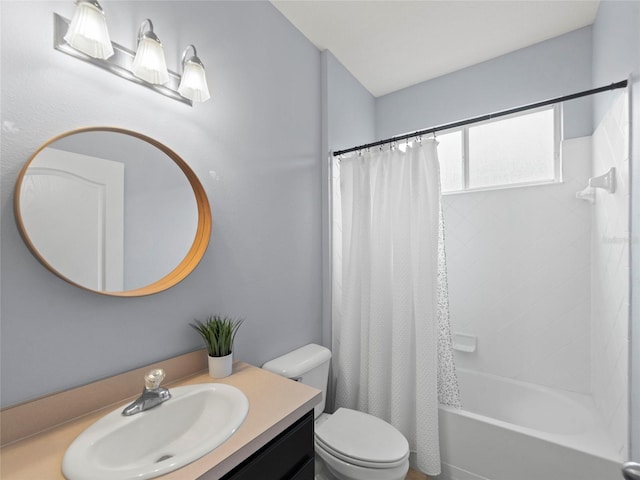 full bathroom featuring vanity, toilet, and shower / tub combo