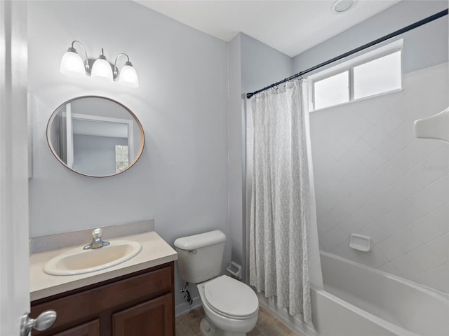 full bathroom featuring toilet, shower / tub combo with curtain, and vanity