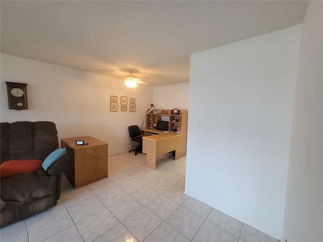 tiled office space with ceiling fan