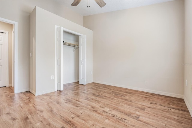 unfurnished bedroom with light wood-type flooring, a closet, and ceiling fan