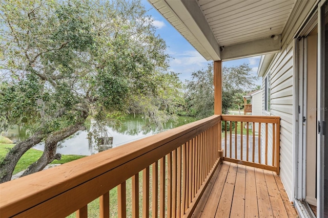 deck featuring a water view